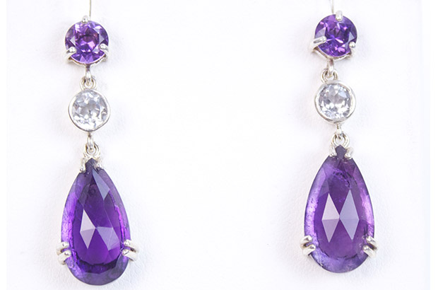 Huizenga’s amethyst and white topaz dangle earrings made in sterling silver ($300). Huizenga’s amethyst and white topaz dangle earrings made in sterling silver ($300).