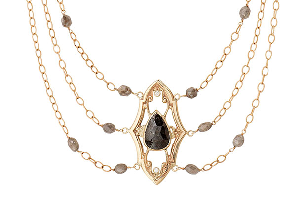 A vintage-inspired pendant from Just Jules sits on a lavalier necklace with a gray center diamond and faceted gray diamond beads in 14-karat gold ($5,000).<br />
<a target="_blank" href="http://justjules.com/"><span style="color: #ff0000;">JustJules.com</span></a>