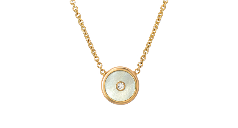 Mini Mother of Pearl Globe necklace in 14-karat yellow gold with mother-of-pearl and white diamond ($635) Mini Mother of Pearl Globe necklace in 14-karat yellow gold with mother-of-pearl and white diamond ($635)