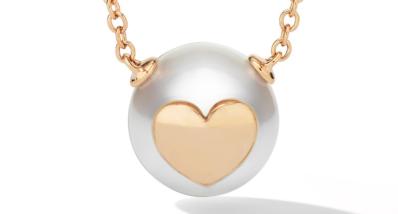A close-up of the heart pendant