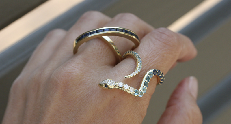 Here a “Queen of the Cosmos” ring, which spins, is paired with a snake ring from the “Diamonds for Lunch” collection. Here a “Queen of the Cosmos” ring, which spins, is paired with a snake ring from the “Diamonds for Lunch” collection.