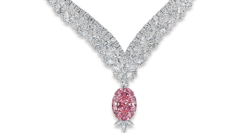 The 30.03-carat Juliet Pink Diamond is a fancy intense, VVS2 stone that’s been cut into an oval shape. It is a set into a necklace with 98.70 carats of marquise, pear and round-cut white diamonds that are E to F in color and VVS clarity. The 30.03-carat Juliet Pink Diamond is a fancy intense, VVS2 stone that’s been cut into an oval shape. It is a set into a necklace with 98.70 carats of marquise, pear and round-cut white diamonds that are E to F in color and VVS clarity.