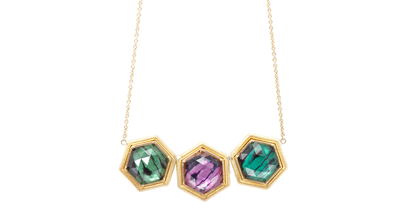 The triple butterfly necklace in 18-karat yellow gold features three pastel butterfly wing patterns on mini hexagon gems ($3,300). The triple butterfly necklace in 18-karat yellow gold features three pastel butterfly wing patterns on mini hexagon gems ($3,300).