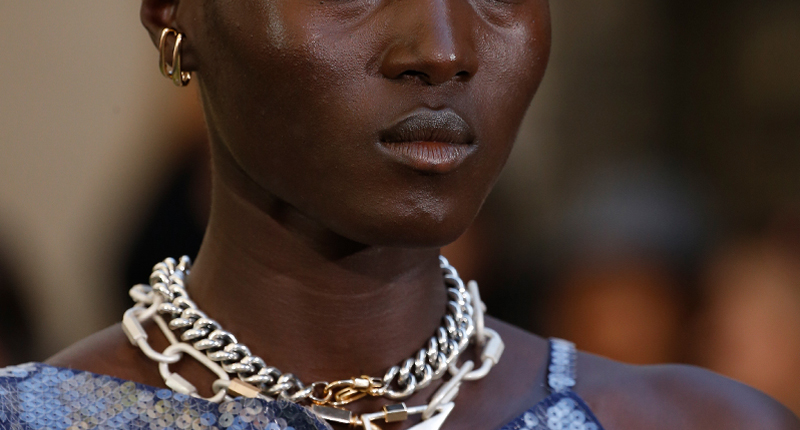 Two of the new “Pierce-less” earrings on the Roland Mouret runway, alongside a bevy of Marla Aaron chains and locks.