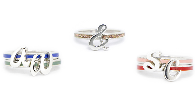 The rings in the collaboration are sterling silver and enamel. They come in five Smith & Cult-inspired colors (from left to right): periwinkle blue à la Exit the Void, celadon green echoing Bitter Buddhist, gold glitter mirroring A Little Lovely, powder pink like Pillow Pie, and a poppy red representing Kundalini Hustle.