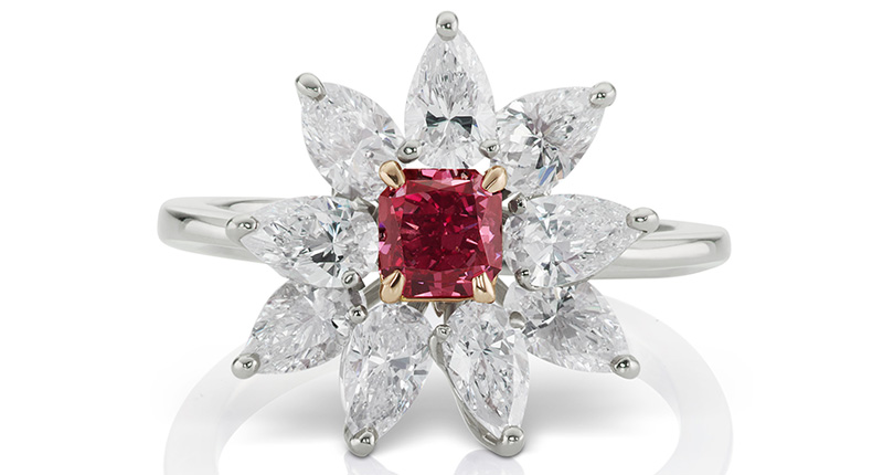 Also at the event from JFine, which is an authorized partner of Argyle Pink Diamonds, was this ring with a 0.48-carat fancy purplish-red radiant-cut diamond surrounded by nine pear-shaped white diamonds (2.70 carats total) set in 18-karat white and pink gold.