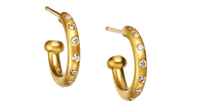 <p><a href="https://www.reinsteinross.com" target="_blank" rel="noopener">Reinstein Ross</a> diamond baby hoops in 20-karat peach gold ($1,500) </p>