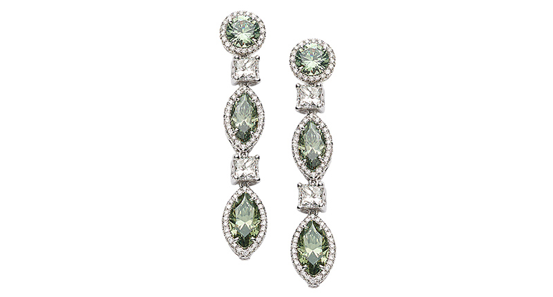 Coomi’s “Trinity” platinum earrings with demantoid garnet and diamonds ($140,000). Couture Villa 210. <a href="http://www.coomi.com" target="_blank">Coomi.com</a>