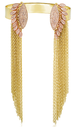 This 18-karat yellow gold and diamond pavé cuff by New York designer Fern Freeman is a modern piece but contains two elements oft-used in ‘70s style: yellow gold and fringe. This 18-karat yellow gold and diamond pavé cuff by New York designer Fern Freeman is a modern piece but contains two elements oft-used in ‘70s style: yellow gold and fringe.