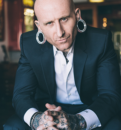 Brian Keith Thompson of Body Electric TattooThompson, a U.S. Marine Corps veteran, took the Corps’ “adapt and overcome” motto to heart. Brian Keith Thompson of Body Electric TattooThompson, a U.S. Marine Corps veteran, took the Corps’ “adapt and overcome” motto to heart.