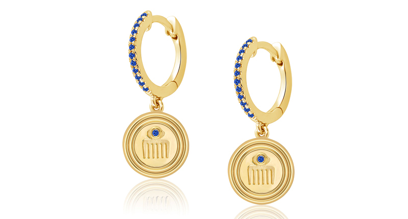 Almasika “Medallion Motif Huggies” in 18-karat yellow gold with sapphires ($2,850). The brand’s medallions are available in different sizes with a variety of symbols and gemstone options.