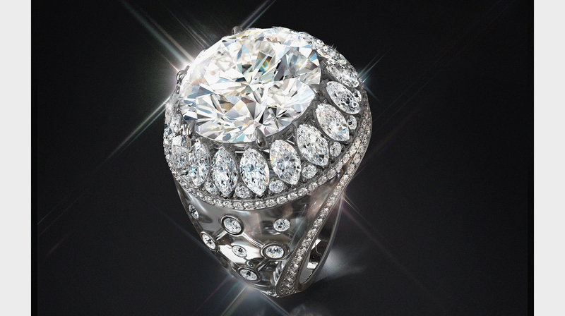 This ring features 14.68 total carats of diamonds, including a 10.31-carat round brilliant-cut diamond center stone.