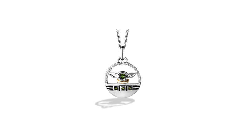 Grogu, a.k.a. Baby Yoda, sits in his hover pram in this sterling silver necklace with 10-karat yellow gold accents, featuring diamonds and green tourmaline ($399.99).