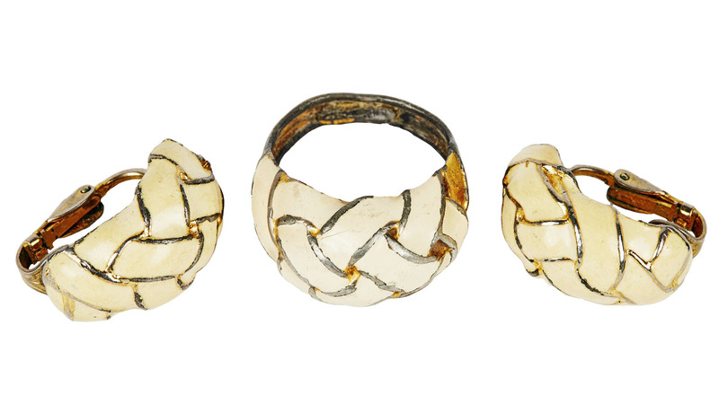 These cream-colored enamel clip earrings and matching ring sold for $12,800. White wore the suite on multiple episodes of The Golden Girls.