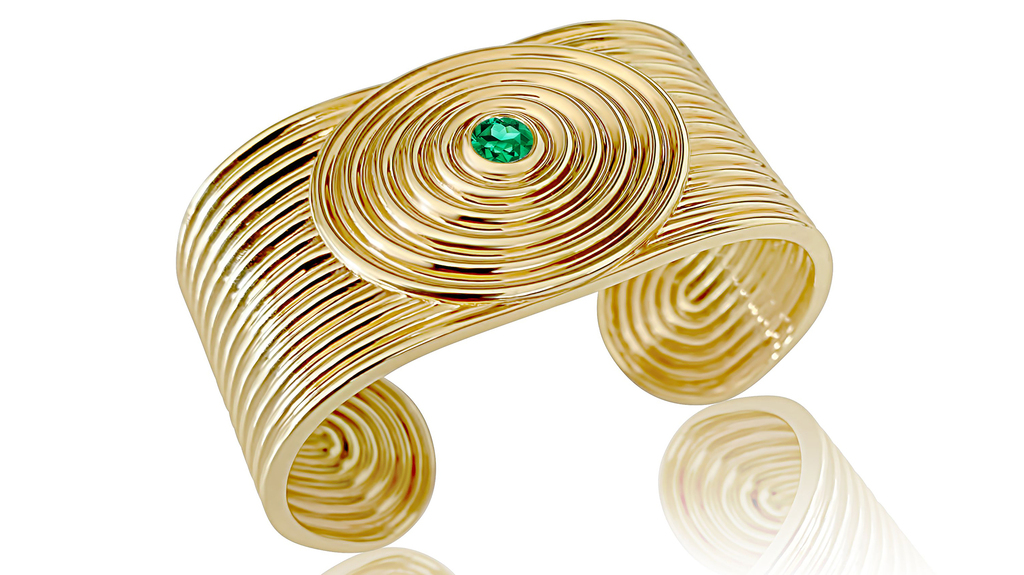 Almasika “Universum Bangle” in 18-karat yellow gold with tsavorite; $24,000. (Image courtesy of Sotheby’s) Almasika “Universum Bangle” in 18-karat yellow gold with tsavorite; $24,000. (Image courtesy of Sotheby’s)