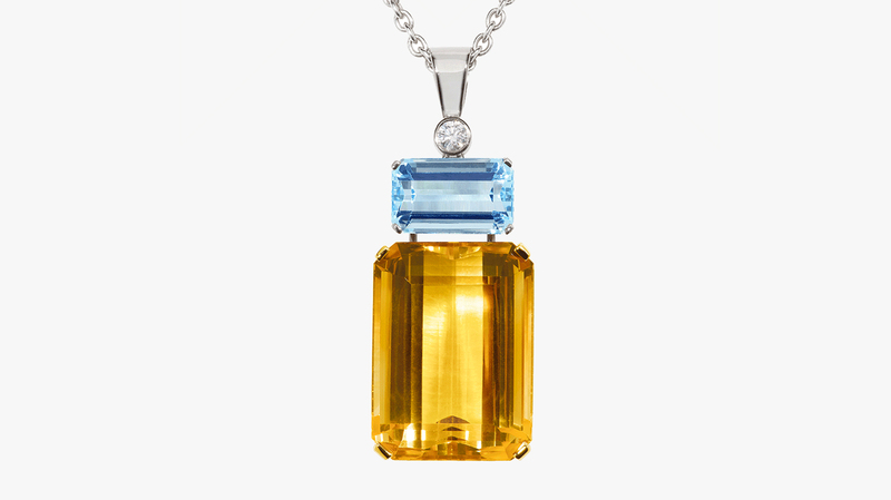 <a href="https://www.nanafink.com/new-products-4/liz-pendant-white-gold-rose-goldaquamarine-citrine-diamond"_blank"> Nana Fink</a> “Liz” pendant featuring citrine, aquamarine, and diamond set in 18-karat white and rose gold ($10,704)