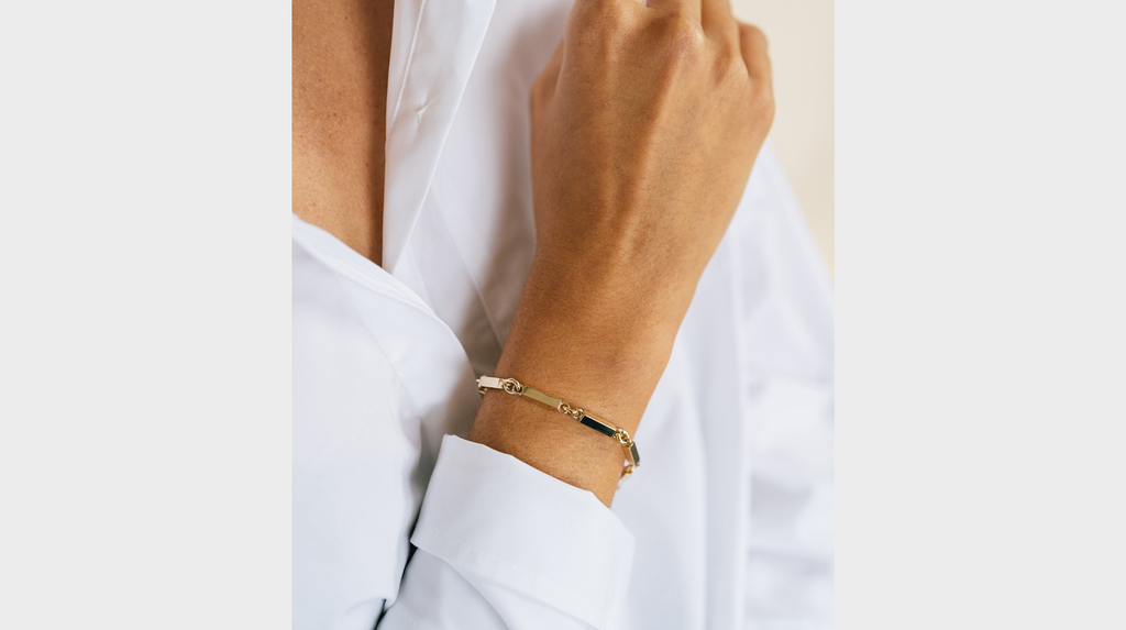 Fewer Finer’s “Family” bracelet, shown worn. Fewer Finer’s “Family” bracelet, shown worn.