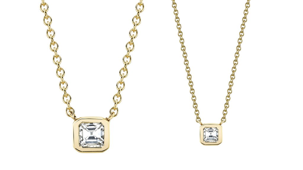 “Mom + Mini” pendants with Asscher-cut diamonds in 18-karat yellow gold in a large and small size, perfect for two loved ones to wear. “Mom + Mini” pendants with Asscher-cut diamonds in 18-karat yellow gold in a large and small size, perfect for two loved ones to wear.