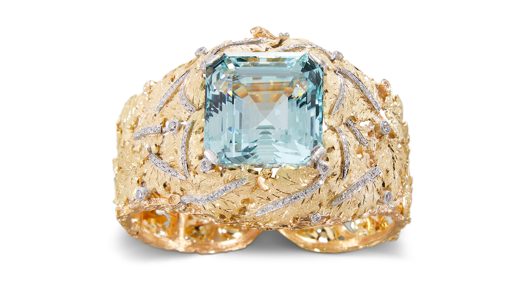 This cuff bracelet, circa 2002, is set with a 74.25-carat carré aquamarine. This cuff bracelet, circa 2002, is set with a 74.25-carat carré aquamarine.