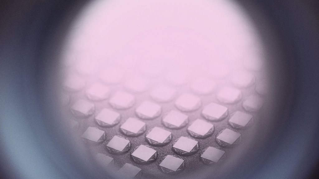 Each reactor is equipped with a viewer that allows employees (and curious visitors) to see the diamond substrate plates as they progress throughout the growing process. Each reactor is equipped with a viewer that allows employees (and curious visitors) to see the diamond substrate plates as they progress throughout the growing process.