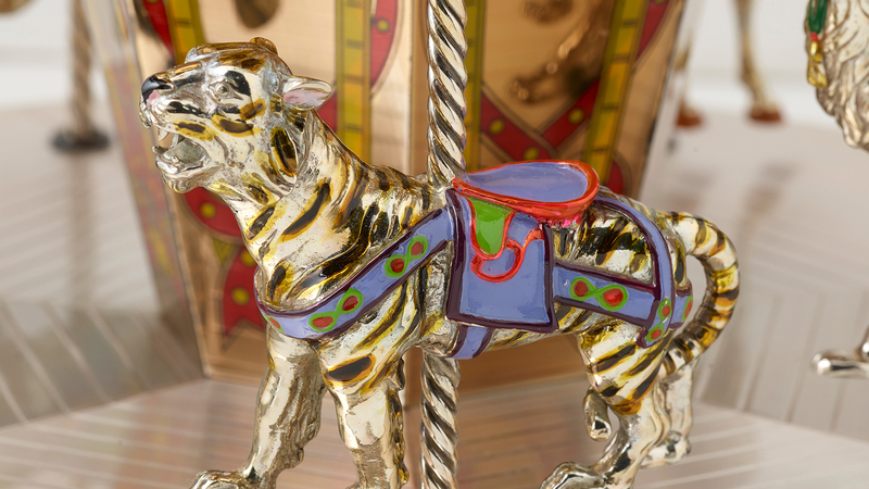 The carousel features this tiger and other animals, including a camel and a giraffe.