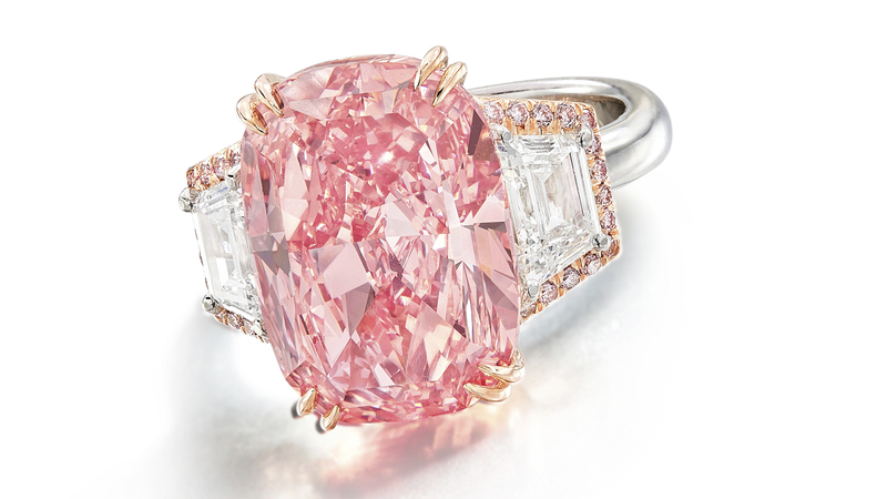 In its current 18-karat gold setting, the diamond is flanked by trapeze-cut diamonds and brilliant-cut pink melee. It’s estimated to sell for $21 million or more. (Photo courtesy of Sotheby’s)