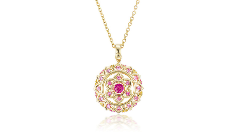 <a href="https://arkfinejewelry.com/" target="_blank">ARK Fine Jewelry</a> “Lotus Blossom” spinning necklace in 18-karat recycled gold with pink sapphire and orange and yellow sapphires on the reverse ($3,400)