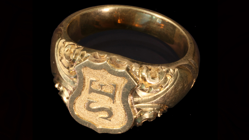 A 9.5 size gold ring with the monogram “SE” carved inside a U.S. shield motif (Photo credit: Holabird Western Americana Collections)