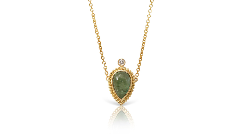 This Lalaounis “Amphora Necklace” crafted in 18-karat gold with a green tourmaline cabochon and diamond is valued at $935. The starting bid is $470.
