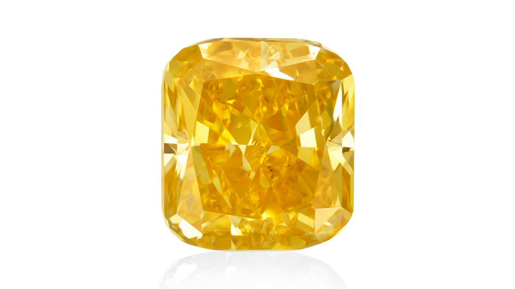 “The Summer Sunrise,” a 9.83-carat VS1 fancy vivid orange-yellow diamond ring, sold for $810,000 at Christie’s recent online-only jewelry auction. “The Summer Sunrise,” a 9.83-carat VS1 fancy vivid orange-yellow diamond ring, sold for $810,000 at Christie’s recent online-only jewelry auction.