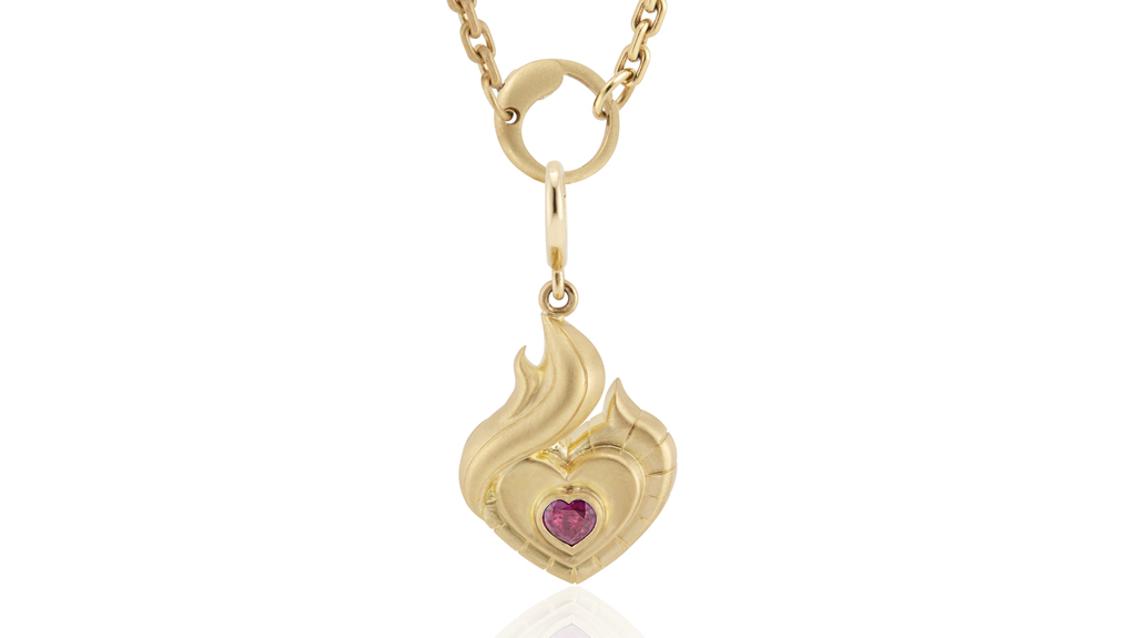 The “Ruby Flame” pendant in 18-karat yellow gold with ruby ($4,995, chain sold separately)
