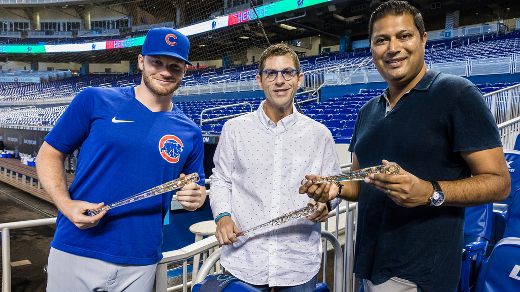 Danny Goldsmith (center) worked with artists Berd Vay’e and MLB player Ian Happ (left) on a special project to coincide with the store opening.