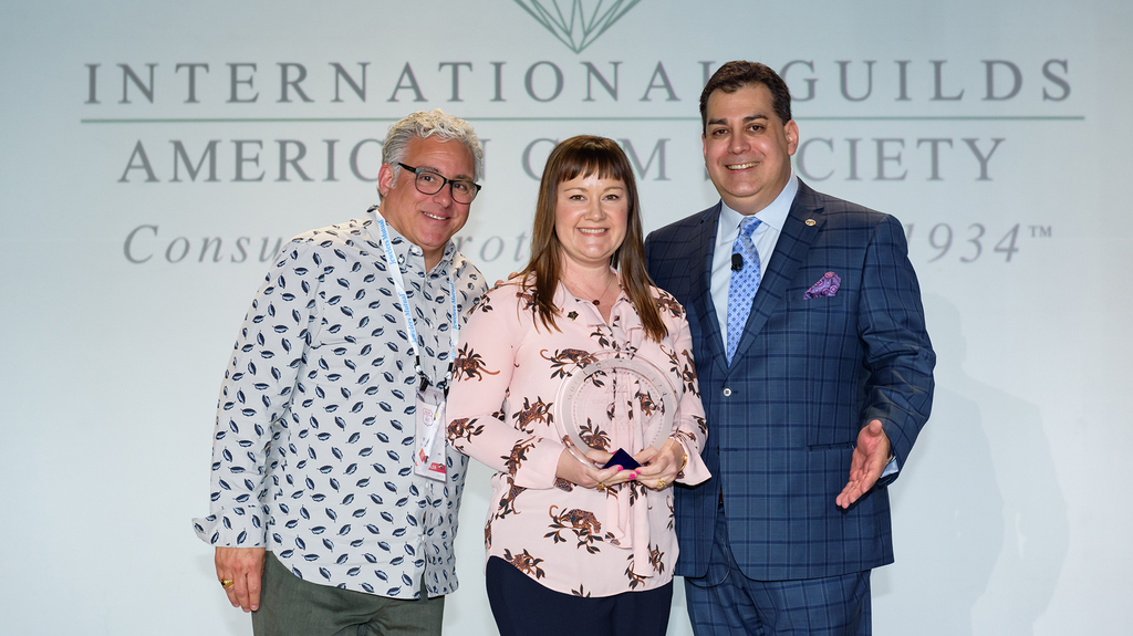 Marc Altman (right) presented the Guild of the Year award to Kara Huddleston (center) alongside Marty Pearlmutter (left) with Lester Martin Jewelers. (Image courtesy of the American Gem Society) Marc Altman (right) presented the Guild of the Year award to Kara Huddleston (center) alongside Marty Pearlmutter (left) with Lester Martin Jewelers. (Image courtesy of the American Gem Society)