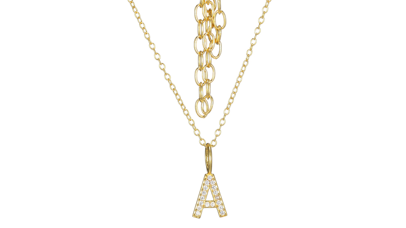 An 18-karat yellow gold plated over sterling silver initial necklace, featuring a letter charm set with crystal pavé ($72)
