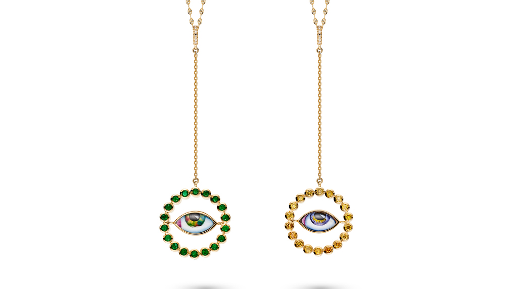 Lito reversible pendant (showing both sides) in 14-karat yellow gold with emeralds, yellow diamonds, white diamonds, and enamel ($7,660)