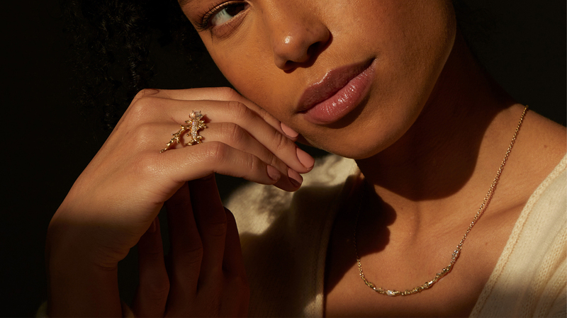 The “Coral” diamond collar ($6,295) and a ring from EDDI designer Dorian Webb