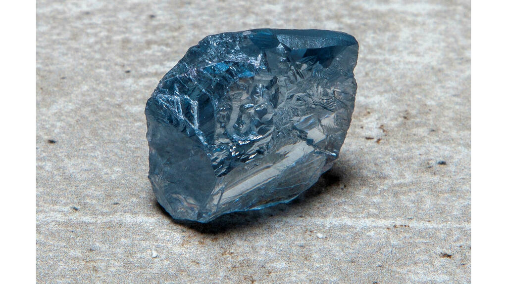 Pictured here is the 39.34-carat rough stone from which Diacore cut the 15.10-carat step-cut De Beers Cullinan Blue diamond.