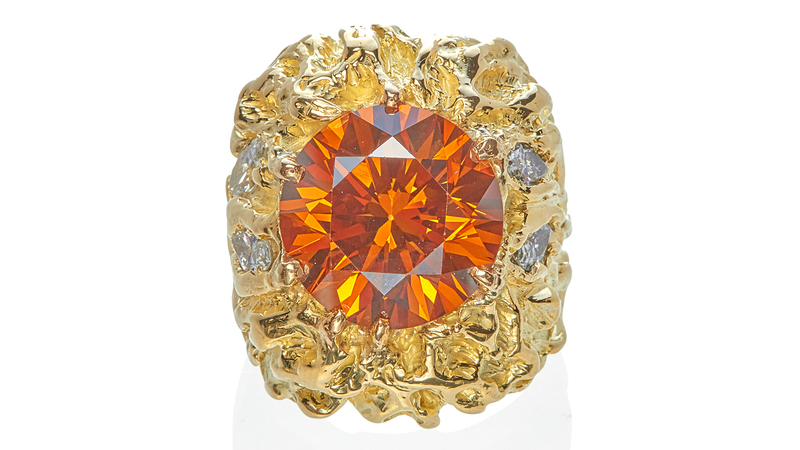 An 18-karat gold, fancy brown diamond and white diamond ring ($7,000-$9,000)