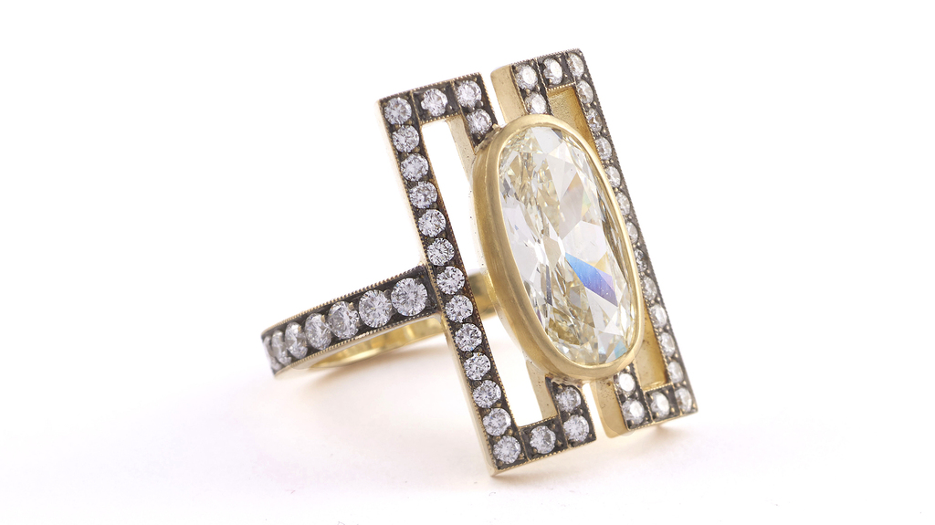 Sylva & Cie ring with 3.1-carat moval (marquise and oval-cut) diamond and 1.15 carats of round brilliant diamonds set in oxidized 18-karat yellow gold ($86,375)