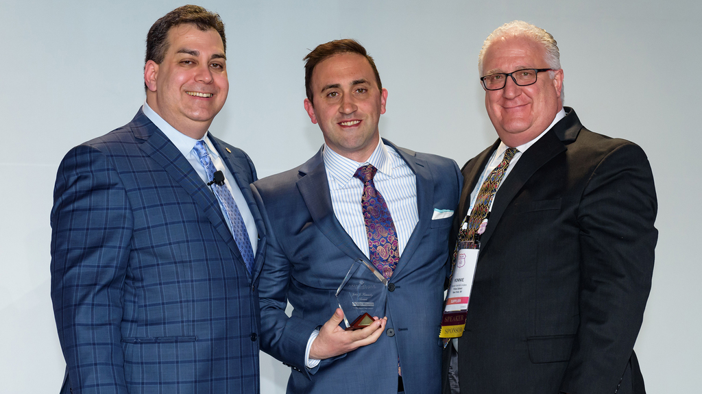 The John J. Kennedy award went to Joseph Metsopulos (center). To his left is Marc Altman, past chair of the Guild Council, and, to his right, Ronnie Vanderlinden, the Supplier’s Task Force chair. (Image courtesy of the American Gem Society) The John J. Kennedy award went to Joseph Metsopulos (center). To his left is Marc Altman, past chair of the Guild Council, and, to his right, Ronnie Vanderlinden, the Supplier’s Task Force chair. (Image courtesy of the American Gem Society)