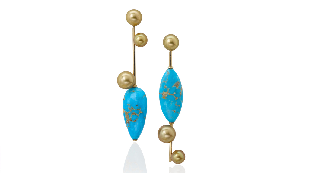 Assael “Duvall” earrings in 18-karat yellow gold with 6.63 carats of Brazilian imperial Topaz, South Sea golden pearls, and dendritic agate hoops (price upon request)