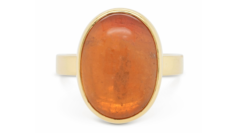 <a href="https://www.valeriemadison.com/products/10ct-peachy-orange-tourmaline-bezel-ring-size-7-5" target="_blank">Valerie Madison</a> orange tourmaline ring set in 14-karat recycled gold ($785)