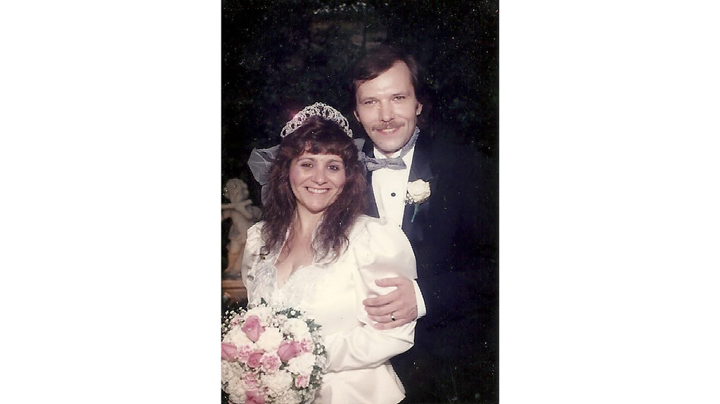 My parents, Mary and Bruce, on their wedding day in July 1993. My mom wore a white satin power suit and a tiara, because, as they say, go big or go home. My parents, Mary and Bruce, on their wedding day in July 1993. My mom wore a white satin power suit and a tiara, because, as they say, go big or go home.