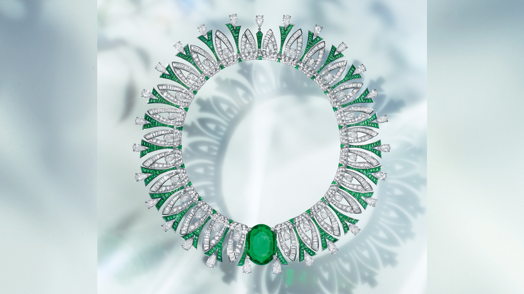 The “Tribute to Paris” necklace in platinum with an oval-cut emerald (35.53 carats), 52 pear-shaped diamonds (31.55 carats), 461 buff-top emeralds (26.63 carats), 317 fancy-shape diamonds (14.11 carats), and pavé diamonds (14.76 carats) The “Tribute to Paris” necklace in platinum with an oval-cut emerald (35.53 carats), 52 pear-shaped diamonds (31.55 carats), 461 buff-top emeralds (26.63 carats), 317 fancy-shape diamonds (14.11 carats), and pavé diamonds (14.76 carats)