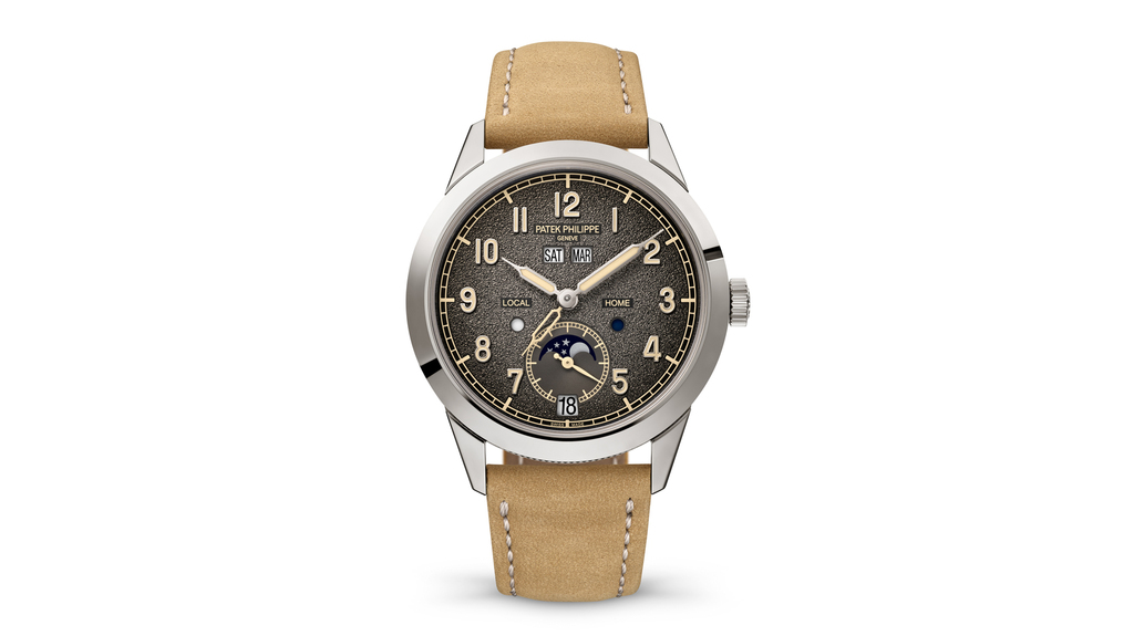 The Ref. 5326G-001 Annual Calendar Travel Time comes with two leather straps—beige and black.