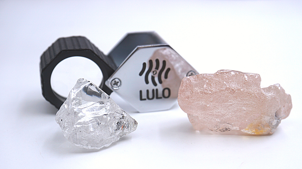 “The Lulo Rose” next to an 80-carat white diamond also mined at Lulo (Photo courtesy of Lucapa Diamond Company Ltd.) “The Lulo Rose” next to an 80-carat white diamond also mined at Lulo (Photo courtesy of Lucapa Diamond Company Ltd.)