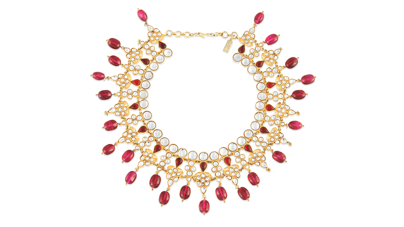 A collar necklace by Shakira Caine, set with red glass beads, sold for £700 ($936).