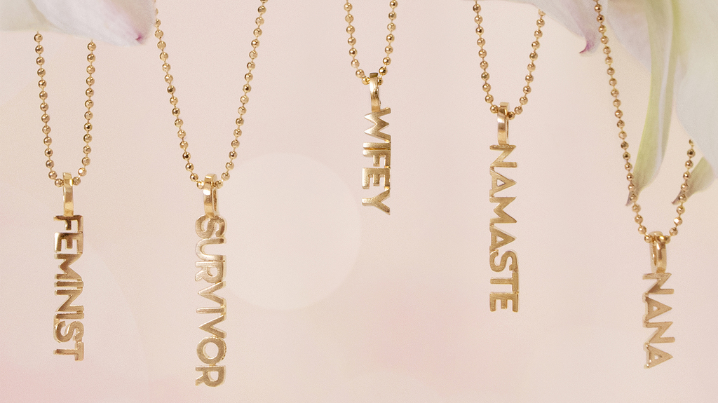 Styles from Alex Woo’s empowering “Mini X Words” collection, launched in March 2020 in honor of Women’s History Month and International Women’s Day