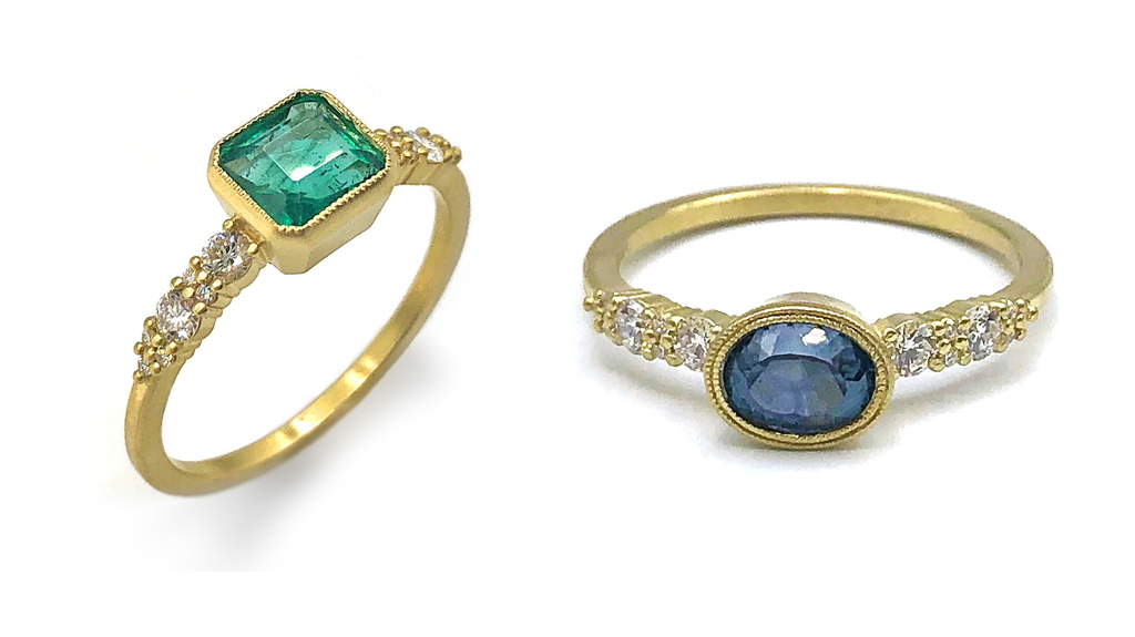 The “Westport” ring at left is centered on a 0.82-carat emerald with diamond accents and 18-karat gold ($4,400), while the “Westport” ring at right comprises a 1.00-carat Montana sapphire cut by John Dyer, with diamonds and 18-karat gold ($6,120).