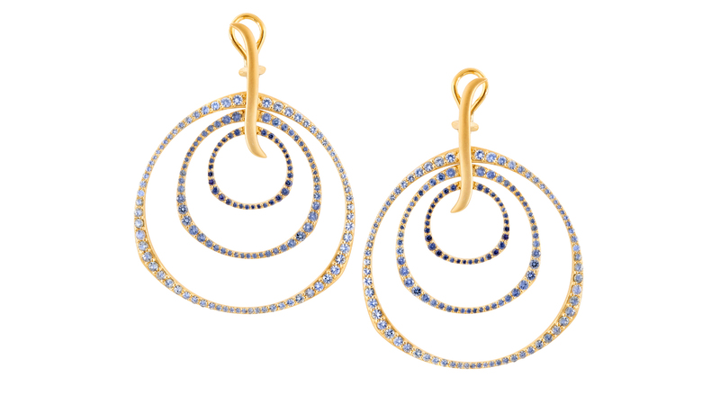 <a href="https://sandyleongjewelry.com/collections/sapphires/products/twilight-ombre-sapphire-triple-hoop-earrings" target="_blank">Sandy Leong</a> ombre blue sapphire triple hoop earrings set in 18-karat recycled yellow gold ($13,200)